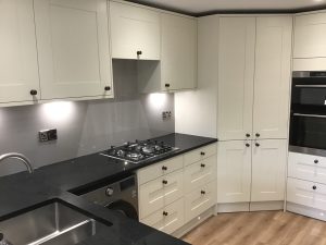 White units, black countertops