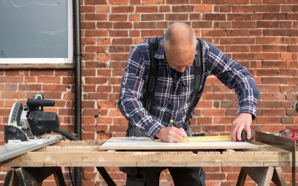 Dale at bench Professional kitchen installation with precision fitting